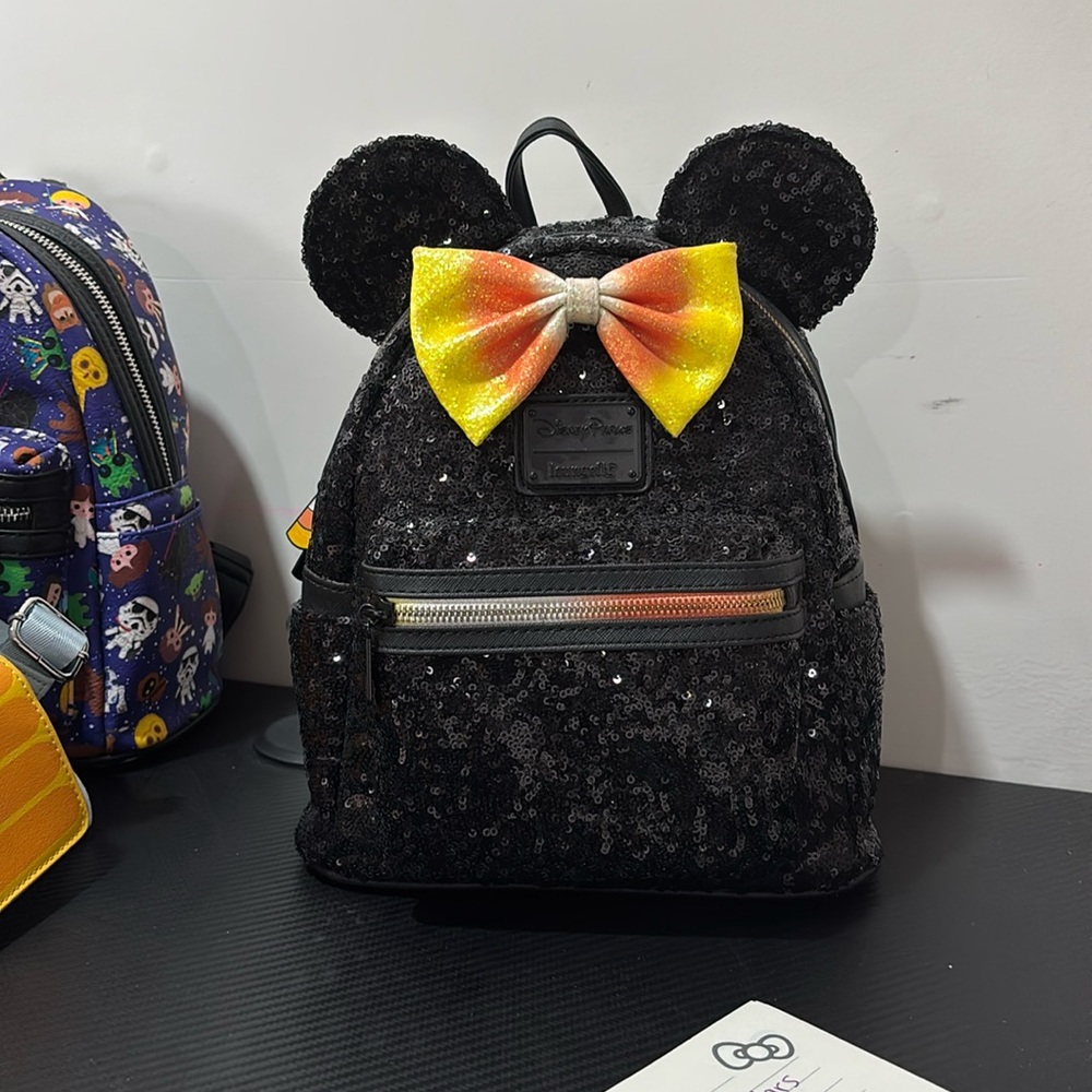 Disney’s parks lounge fly Halloween black sequence, candy corn backpack
